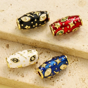 Enamel evil eye and gold star spacers in black, red, white, and blue for DIY bracelets