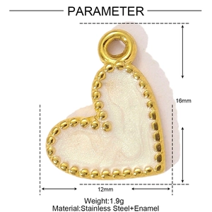 Detailed view of heart-shaped stainless steel pendant with white enamel and golden trim