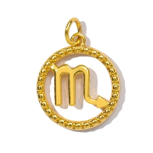 Close-up of a gold Scorpio zodiac pendant with beaded edges and hollow center