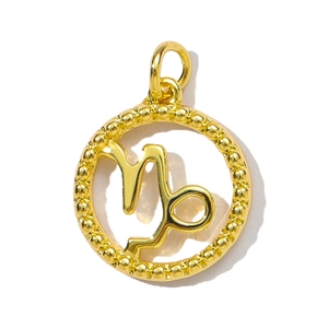 Detailed close-up of a golden Capricorn zodiac pendant with ornate beaded edge