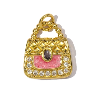 Pink enamel handbag charm in gold finish with sparkling crystals and rhombus pattern