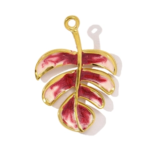 Elegant gold-framed leaf pendant with red and white marble enamel textures