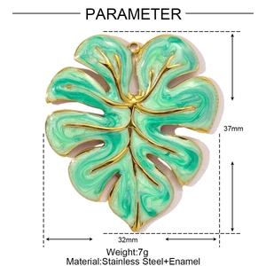 Detail showing 37mm monstera leaf pendant in gold and marble green enamel finish