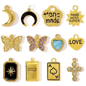 Breloques Vintage en Acier Inoxydable DIY Papillon Lune Cœur Croix Poker Pendentifs Lingot d'Or pour Création de Bijoux Accessoires Strass Émail