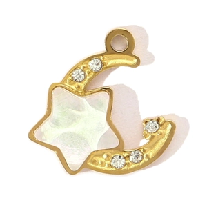 Detail view of gold star and moon pendant with shell inlay and cubic zirconia