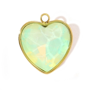 Detailed view of faceted heart pendant in mint green glass with a golden metal frame