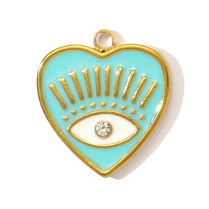 Detail of a heart-shaped blue enamel pendant with eye motif and sparkling crystal