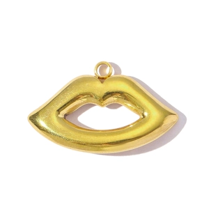 Close-up of golden lip-shaped stainless steel charm with a polished mirror finish