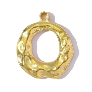 Golden hammered geometric round pendant in stainless steel with textured finish