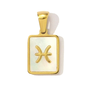 Macro detail of gold-plated Pisces zodiac pendant with white shell inlay and sleek edges