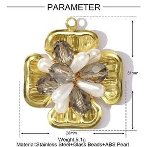 Detail showing clover pendant dimensions 31mm by 28mm in gold steel with pearls