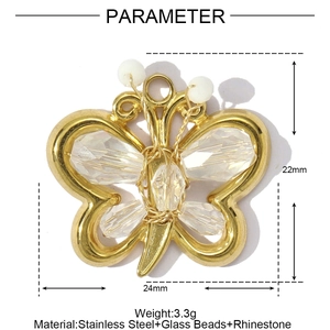 Detailed close-up of a 24mm gold stainless steel butterfly pendant with crystal beads