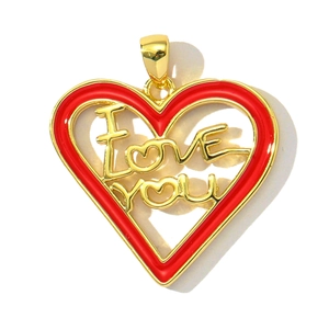 Detail of a red heart-shaped gold pendant featuring I Love You engraving for jewelry making
