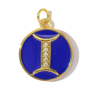 Detail of round gold pendant with blue enamel and five sparkling cubic zirconia stones
