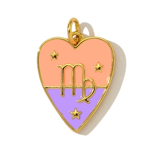 Detail view of heart-shaped Virgo pendant with orange and purple enamel and gold plating