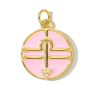 Macro detail of round pink enamel Sagittarius pendant with gold plating and zircon inlay
