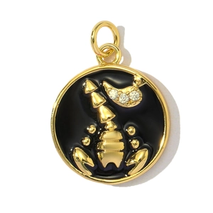 Macro detail of Scorpio zodiac pendant with black enamel and gold scorpion inlay