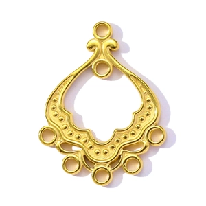Close-up of gold-plated fan-shaped pendant showing embossed texture and connectivity loops