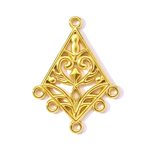 Detailed view of golden fan-shaped stainless steel pendant with hollow scroll patterns