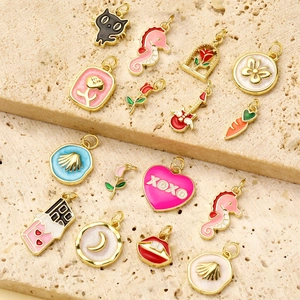 Mix of colorful enamel charms including cats, moon and flowers for DIY jewelry making