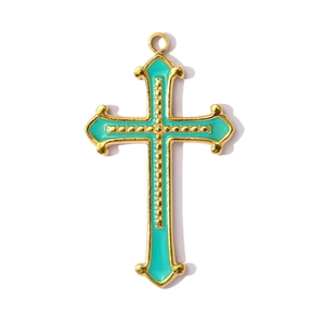 Detailed view of the turquoise enamel cross pendant with golden beaded metal accents