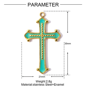 Detail of green enamel cross pendant in gold stainless steel with 35mm height dimension