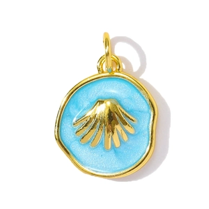 Detail of blue enamel round pendant with gold shell relief and wavy gold edges