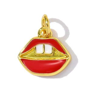 Detailed view of a red lip pendant with gold plating and white enamel teeth charm