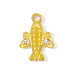 Detailed close-up of golden aircraft pendant with rhinestone accents for DIY jewelry