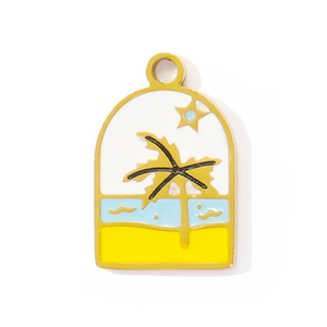 Detail of beach landscape enamel charm with coconut tree and golden metal edge
