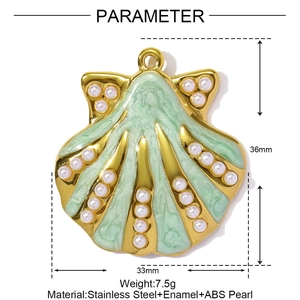 Detail of mint green enamel shell pendant with white pearls and gold steel base