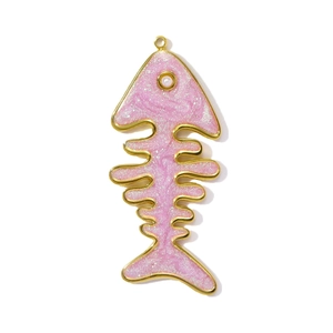 Detailed view of pink fishbone pendant in gold finish with sparkling glitter and pearl eye