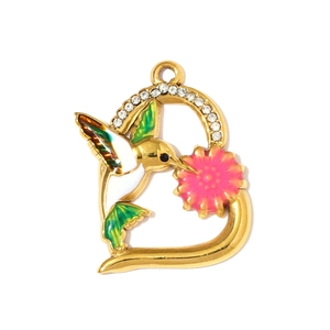 Detail of hummingbird and flower pendant with crystal inlays and colorful enamel finish