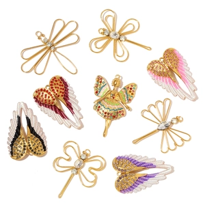 Sparkling crystal dragonfly, fairy, and wing pendants in gold stainless steel finish