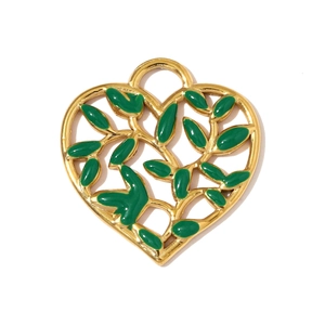 Detail of heart-shaped hollow gold pendant with dark green enamel leaves for DIY jewelry