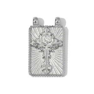 Detailed relief of rose and cross on silver rectangular stainless steel pendant