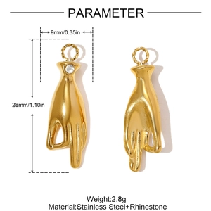 Detailed view of gold stainless steel gesture pendant with rhinestones and size data