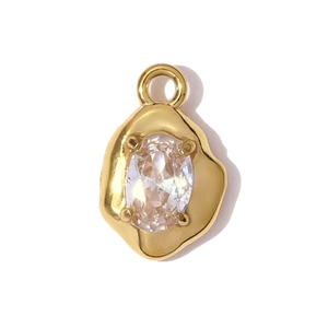 Detailed view of oval zircon pendant with irregular gold stainless steel frame