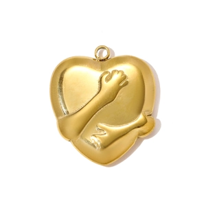 Detailed view of heart-shaped gold pendant featuring an embossed hugging love motif