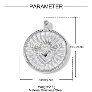 Detailed view of silver stainless steel winged heart pendant with size parameters