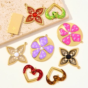 Stainless steel flower and heart pendants with Good Luck charms and enamel finish