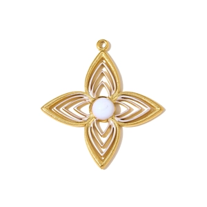 Macro detail of a gold openwork flower pendant with an elegant white opal centerpiece