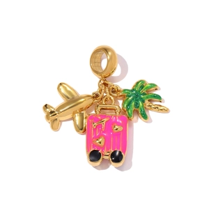 Travel theme pendant featuring gold airplane, pink suitcase and palm tree charm details