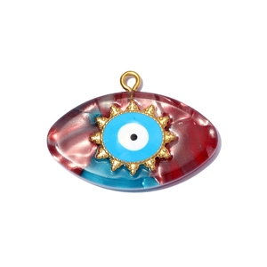 Detailed shot of resin Evil Eye pendant with marble texture and golden sunburst frame