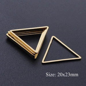 Macro view of gold triangle stainless steel pendants for DIY jewelry making 20x23mm