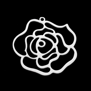 Macro detail of hollow rose flower charm in polished stainless steel for DIY jewelry