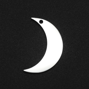 Detailed view of a silver crescent moon stainless steel pendant with a small hanging hole