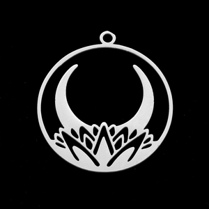 Close-up of a silver stainless steel lotus and crescent moon hollow pendant charm