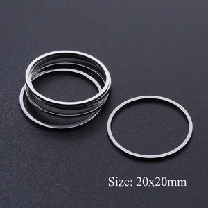 Detail of five 20x20mm stainless steel round rings for DIY jewelry making and pendants