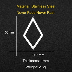 Macro detail of geometric rhombus stainless steel pendant with dimensions and weight info